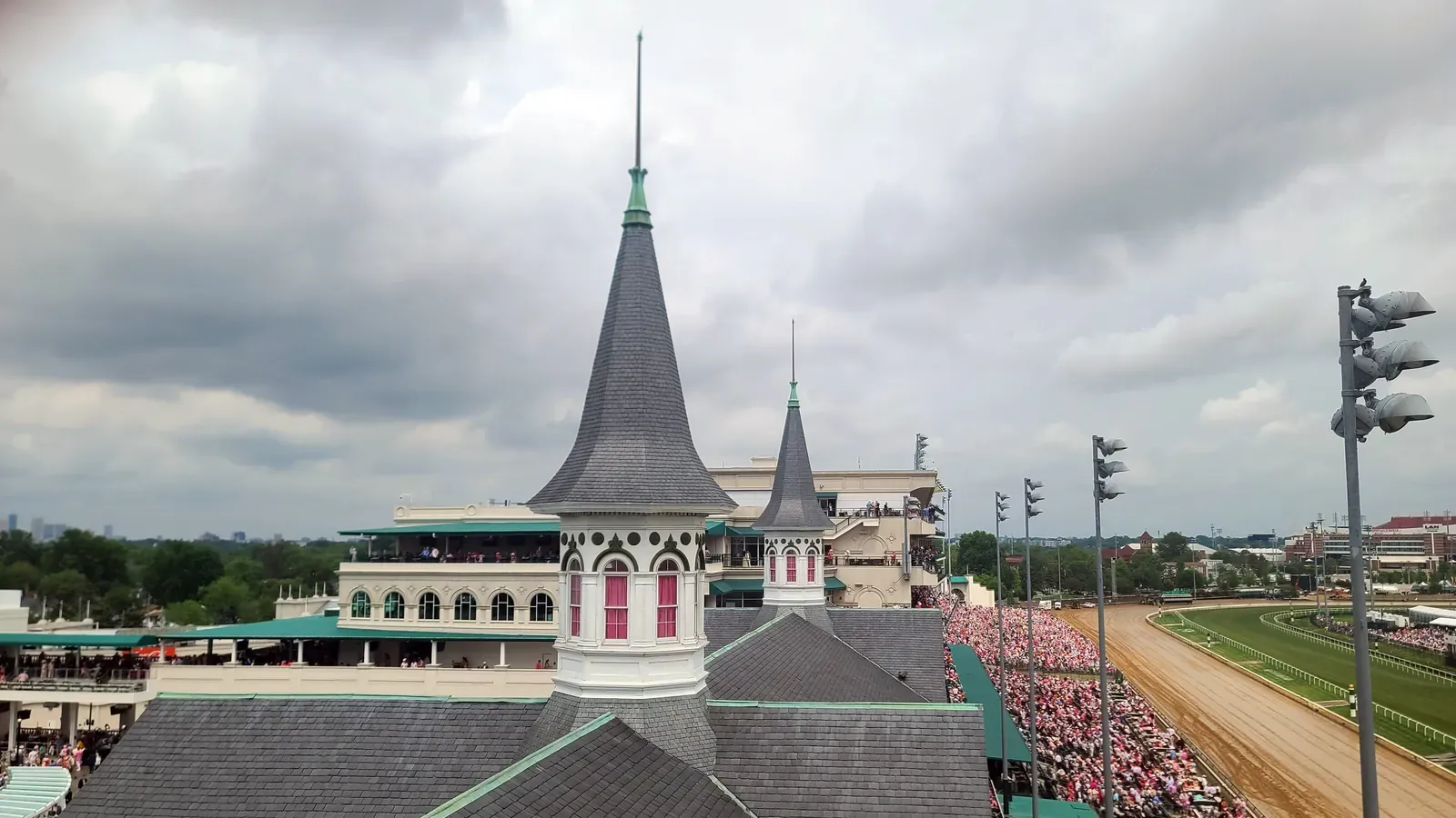 The Twin Spires above the grandstand at Churchill Downs, dressed in pink for the 2024 Kentucky Oaks