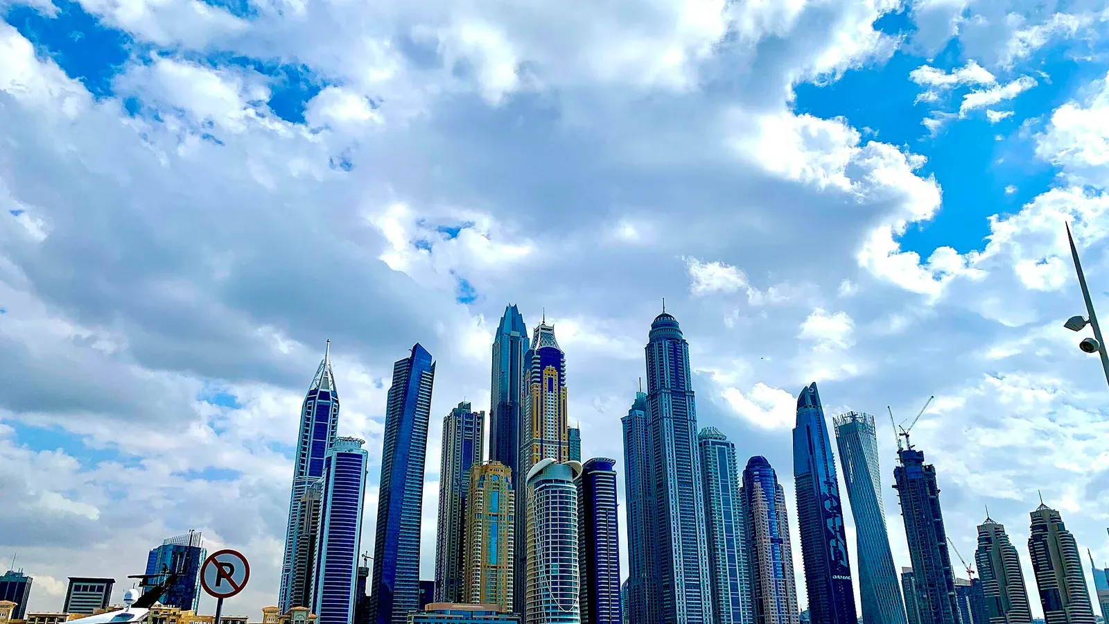 The Dubai Marina skyline viewed from Dubai Harbour in May 2022, outside the boat show
