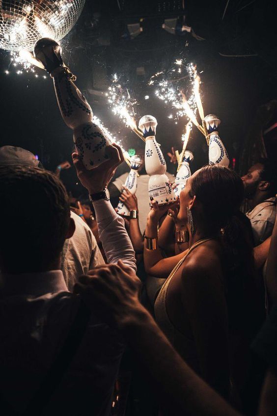 Bottle service and sparklers at an evening celebration