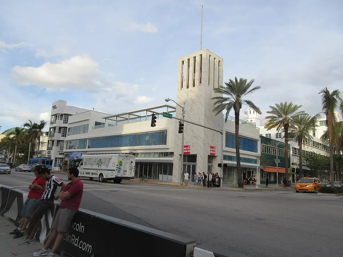 Lincoln Road in Miami Beach with palm trees and an art deco tower