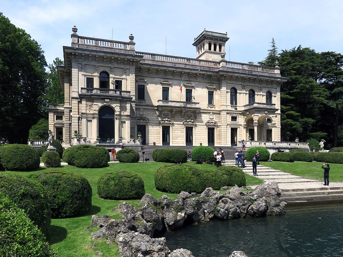 The ornate facade of Villa Erba above its terraced gardens