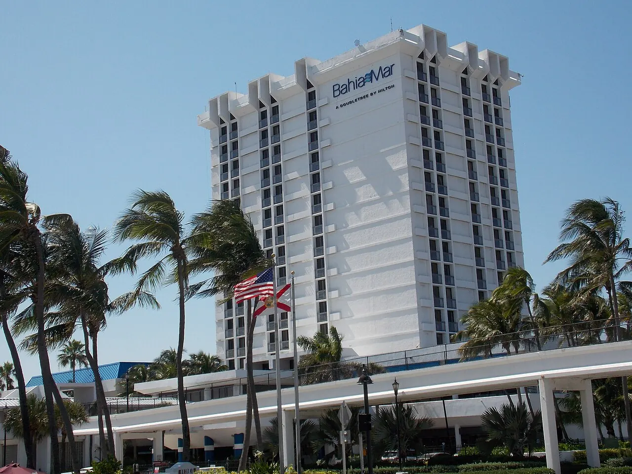 The Bahia Mar hotel tower among palm trees in Fort Lauderdale
