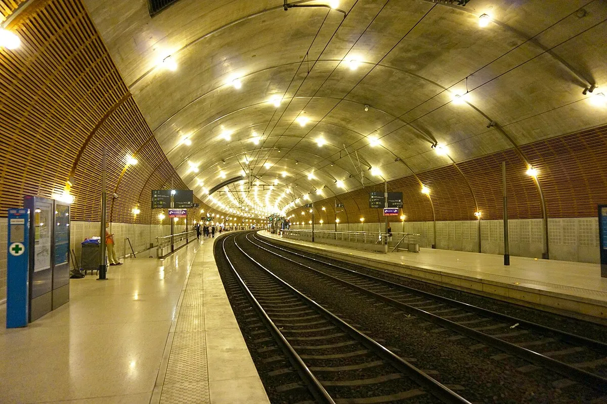 The long curved underground platform of Monaco-Monte-Carlo railway station