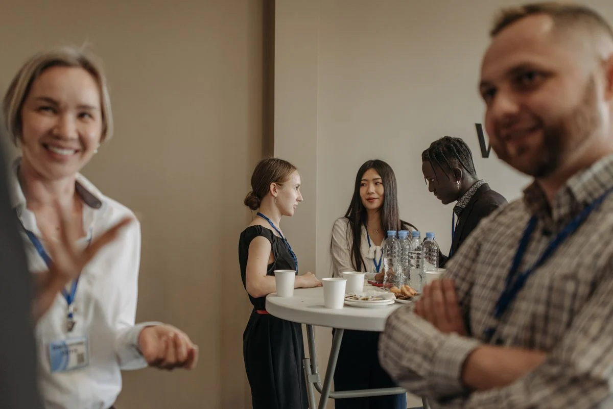 Guests talking during a conference break
